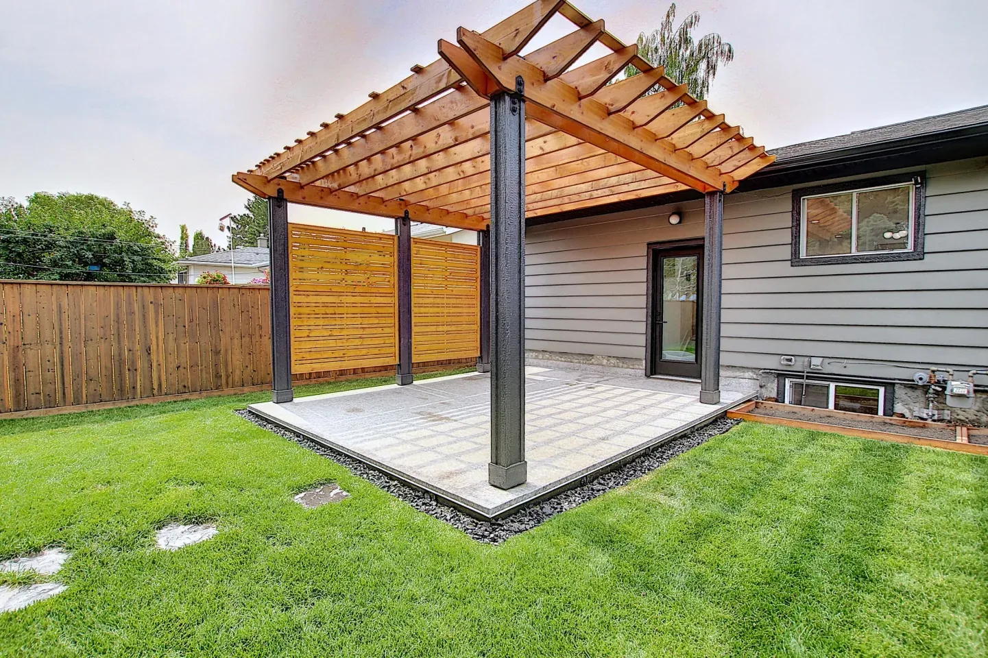 Calgary home incorporating a custom Pergola
