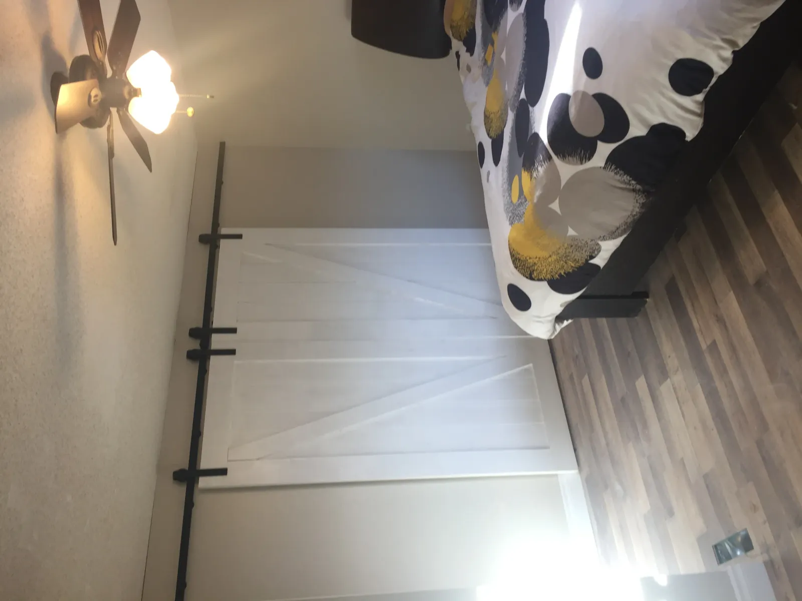 Barn door in a master bathroom renovation