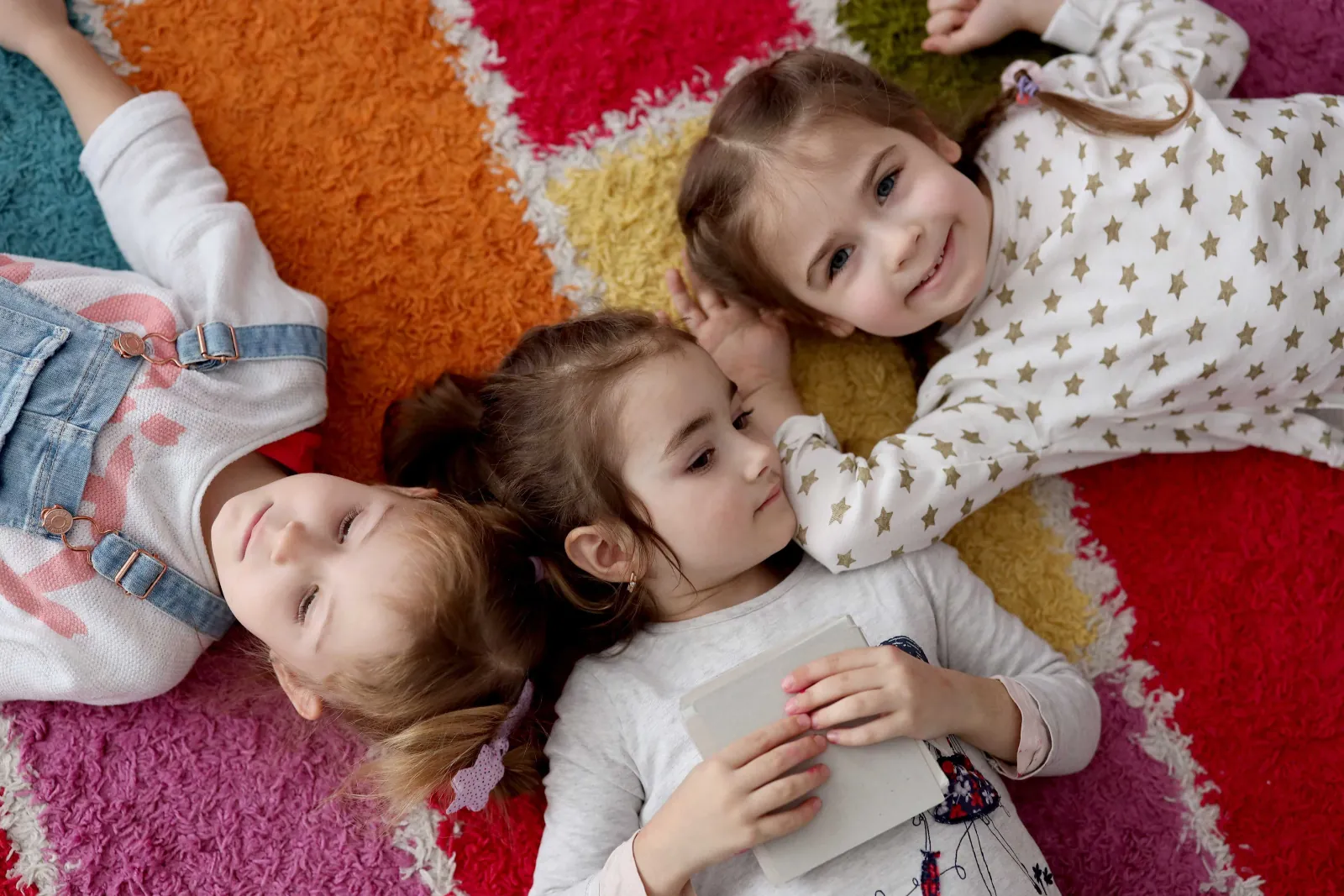 Kids enjoying carpet in their new home