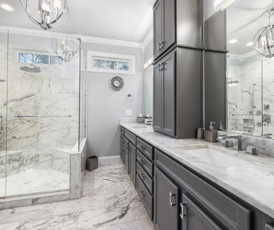 Close-up of geometric mosaic tile floor in high-end Calgary bathroom