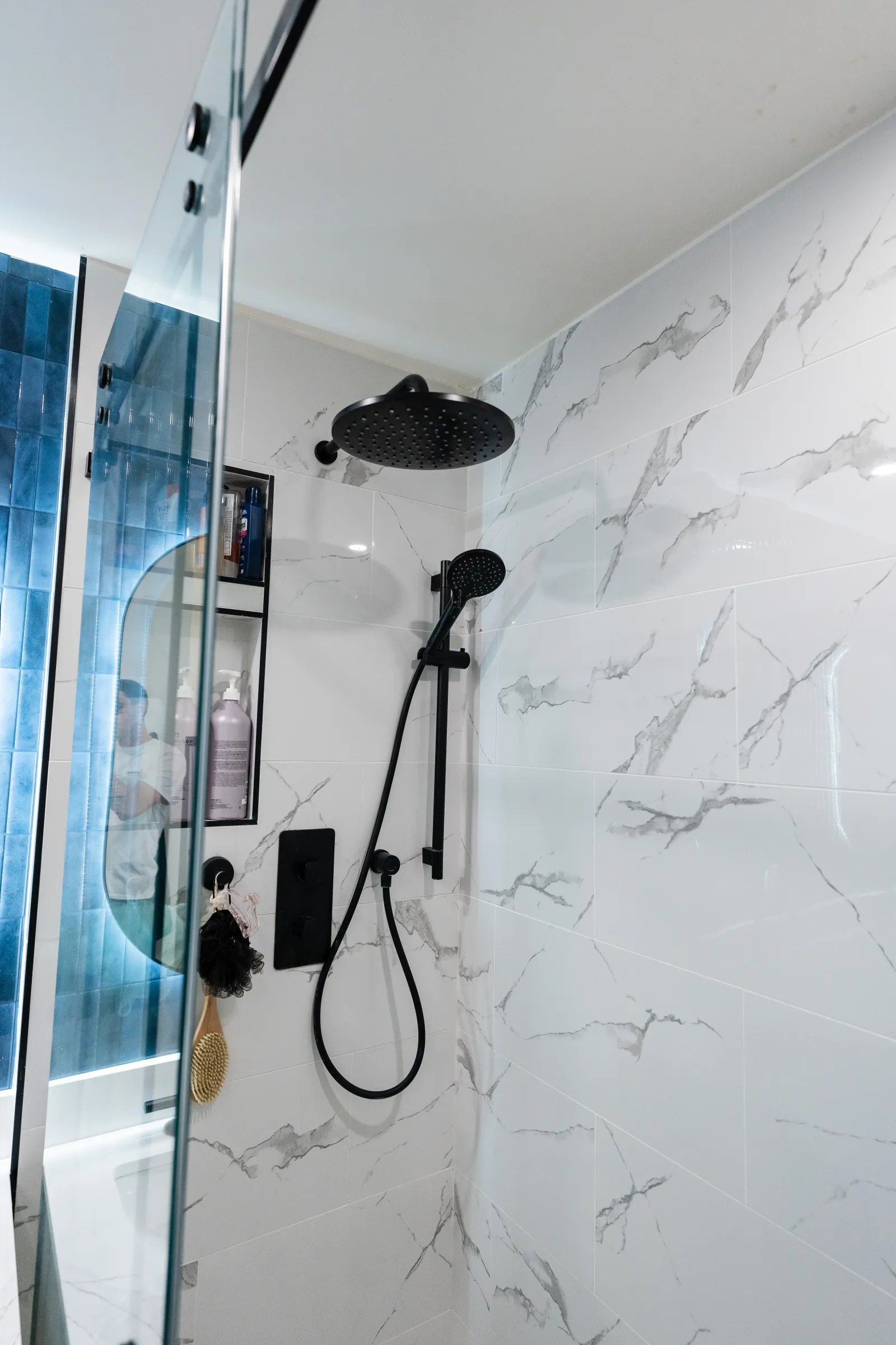 Matte black rain shower in a bathroom renovations in Calgary