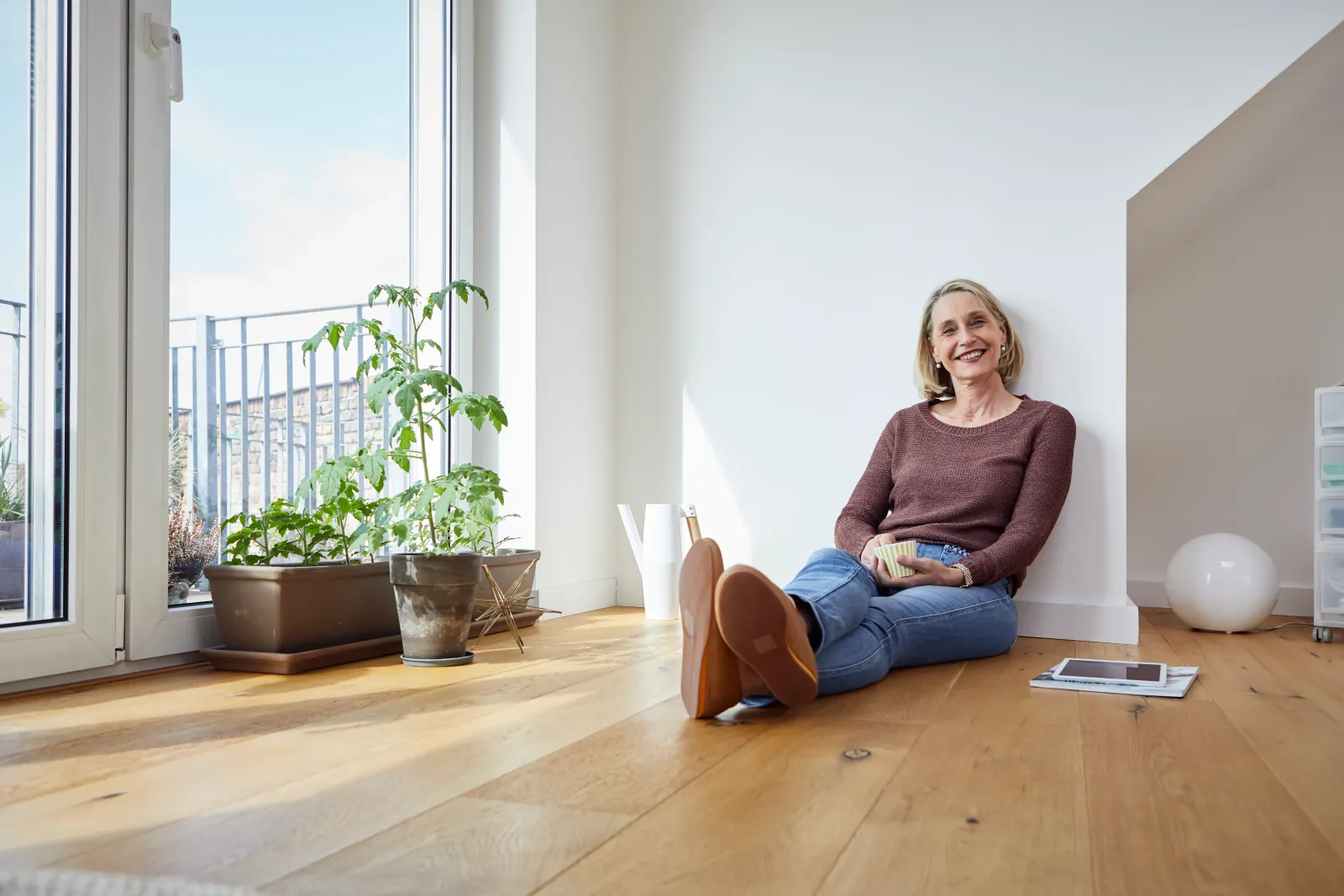 A happy woman in her new Calgary home renovation